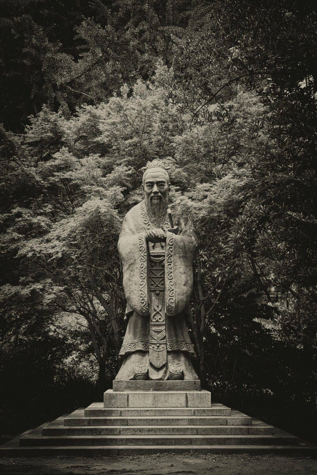 Grayscale Photo of Statue of Confucius